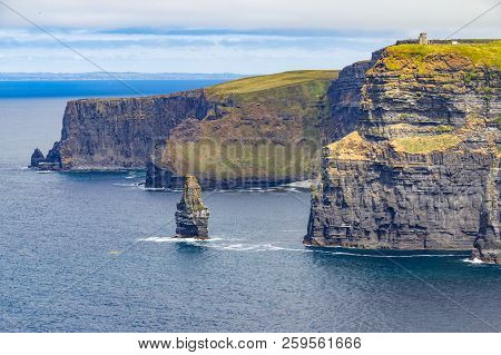 Caslte Tower And Rocks In Cliffs Of Moher