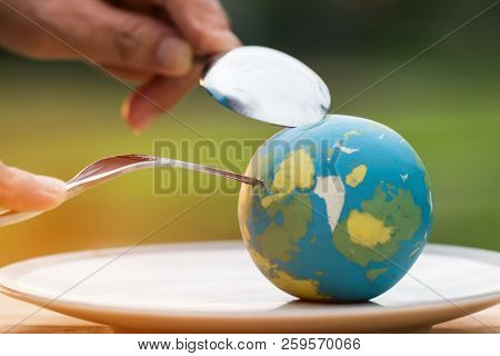 Globe Model Placed On Plate With Fork Spoon For Serve Menu In Famous Hotels. International Cuisine I
