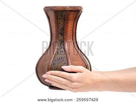 Wooden Vase In Hand On White Background Isolation