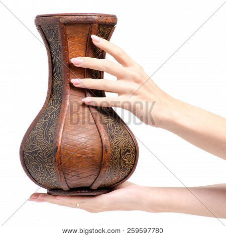 Wooden Vase In Hand On White Background Isolation