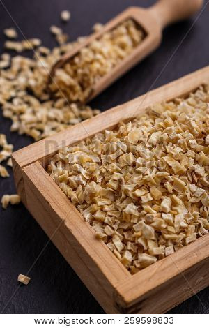 Fragrant Dried Parsnip On A Dark Stone Background
