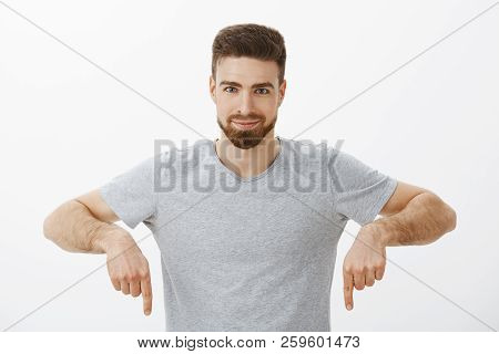 I Gota Buy It. Confident Enthusiastic And Creative Charismatic Man With Beard And Brown Haircut Poin