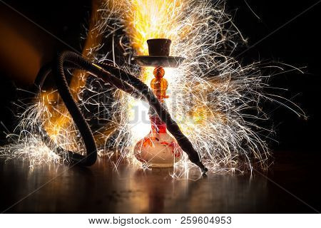 Hookah Hot Coals On Shisha Bowl Making Clouds Of Steam. Shisha Explosion. Stylish Oriental Shisha In