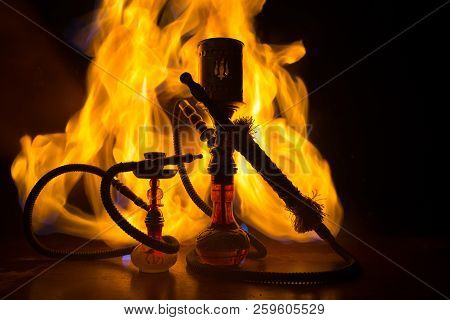 Hookah Hot Coals On Shisha Bowl Making Clouds Of Steam. Shisha Explosion. Stylish Oriental Shisha In