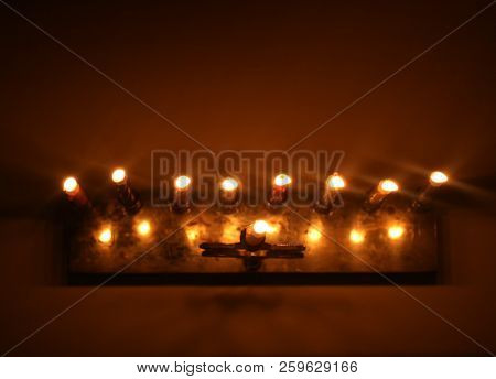 Hanukkah Is A Jewish Holiday. Burning Chanukah Candlestick With Candles. Chanukiah Is A Menorah. Vie