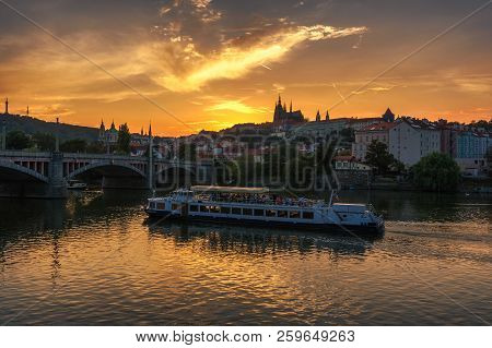 Prague, Czechia - September 19, 2018 : Cruise Boat With Tourists On Vltava River Floats Towards The 