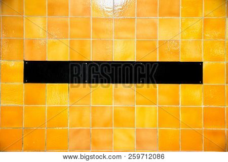 Black Rectangular Panel With Copyspace On A Tiled Wall