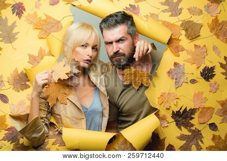 Romantic Couple On Autumn Leaves Background. Beautiful Tender Couple Advertise Your Product And Serv