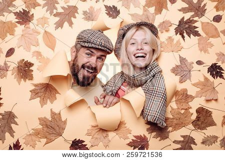 Funny Couple Are Getting Ready For Autumn Sale. Surprised Couple On Autumn Clothes Discounts, Bearde