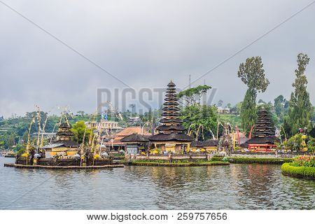 Pura Ulun Danu Bratan, Bali. Hindu Temple Surrounded By Flowers On Bratan Lake, Bali. Major Shivaite