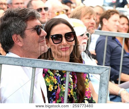 LOS ANGELES - SEP 20:  Lauren Silverman, Simon Cowell at the Carrie Underwood Star Ceremony on the Hollywood Walk of Fame on September 20, 2018 in Los Angeles, CA