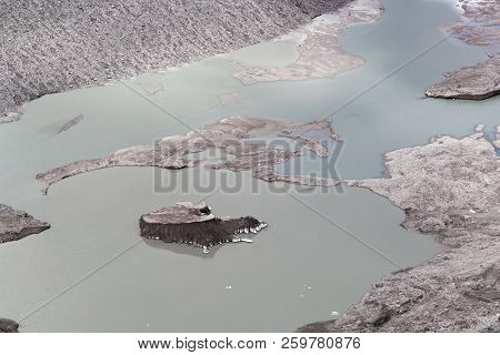 Glacier Lake At The Pasterze Glacier In The Austrian Alps.