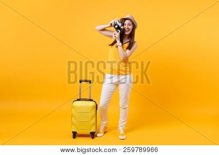Tourist Woman In Summer Casual Clothes, Hat With Suitcase, Retro Vintage Photo Camera Isolated On Ye