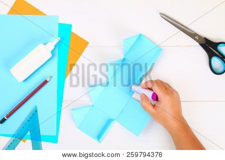 Diy. Paper Dreidel With His Own Hands Made Of Paper. Sevivon To The Jewish Holiday Of Hanukkah. Hand