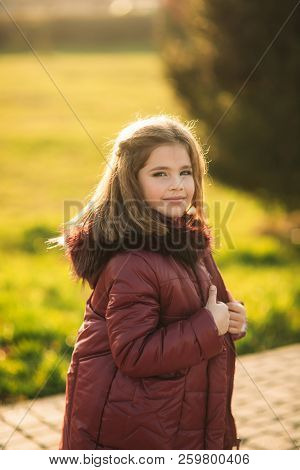 Girl Model In Jaket Poses To Photo