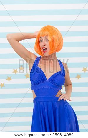 Modern Hair Coloring At Hairdresser Salon. Crazy Girl Made Hair Coloring In Orange Color. Crazy Look