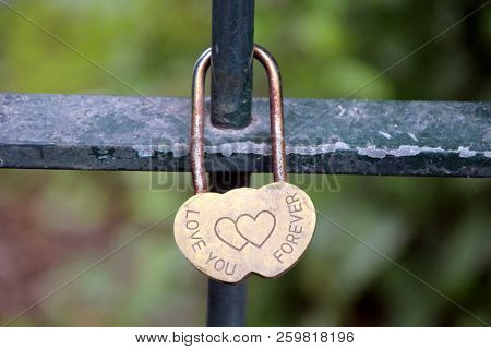 Close Up On A Cadena Bearing The Inscription Love You