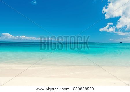 Beautiful Marine View On Aribbean Sea Coast Line With Clean Wavy Surf Ocean Water On Sandy Beach At 
