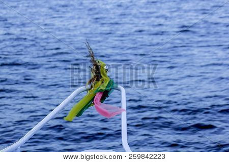 Three Colored Cloth Tied To The Boat.