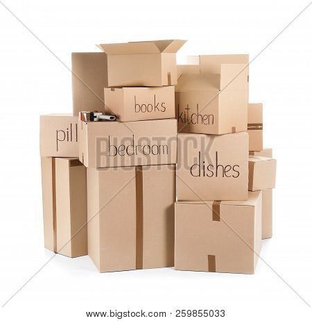 Moving Boxes And Adhesive Tape Dispenser On White Background
