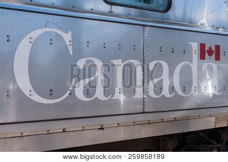 Jasper, Canada - July 5, 2018: Canada On The Side Of A Rail Canada Passenger Car In Jasper, Canada