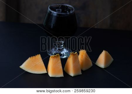 Fresh Melon With Grass Jelly In A Glass Isolated On Table Background