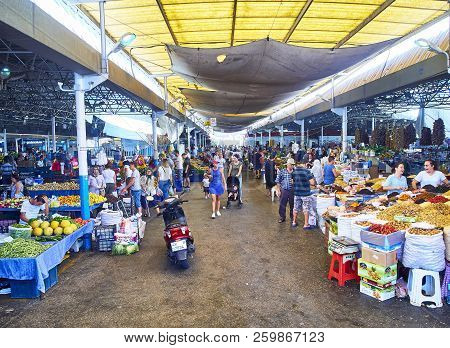 Bodrum, Turkey - July 6, 2018. Citizens shopping in Bodrum market, Kapali Pazar Yeri, at downtown. Mugla Province, Turkey.