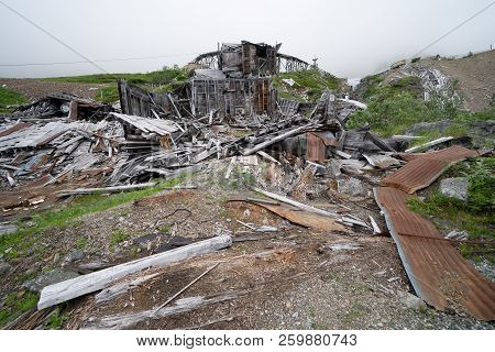 Ruins Of An Old Abandoned Mining Building At Independence Mine Along Alaska's Hatcher Pass