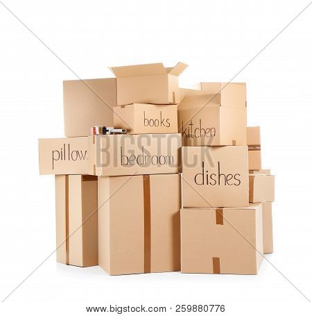 Moving Boxes And Adhesive Tape Dispenser On White Background