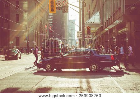 Toronto, Canada - September 17, 2018: Rush Hour At Toronto Downtown, Many People On The Street. Suns