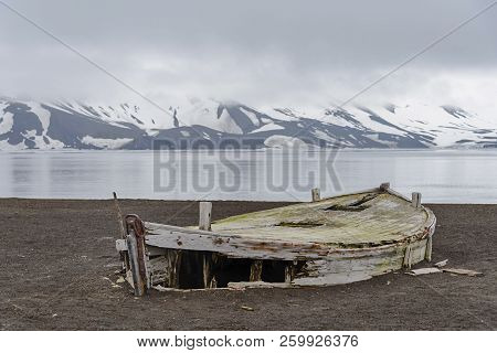 Old Wooden Boat On The Beach On Deception Island, Antarctica