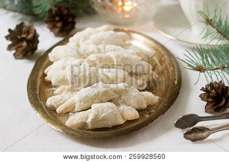 Traditional Romanian Or Moldovan Shortcake Cookies With Jam Stuffing And A Cup Of Tea On The Backgro