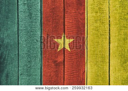 Old  Wooden Table Texture Background Top View  With A National Flag Of Cameroon. Cameroon Flags Imag
