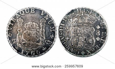 Antique Spanish Silver Dollar Dated 1765 Showing Front And Back Of Coin.