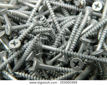 Close Up Of A Pile Of Galvanised Screws