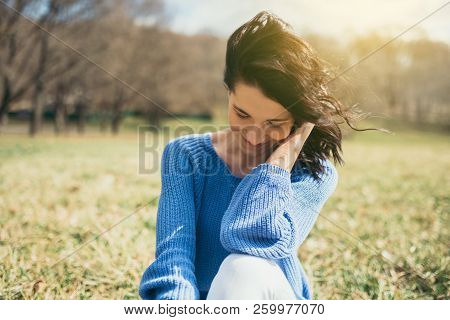 Happy Dreamy Female With Closed Eyes With Hand On Face. Portrait Of Attractive Brunette Caucasian Yo