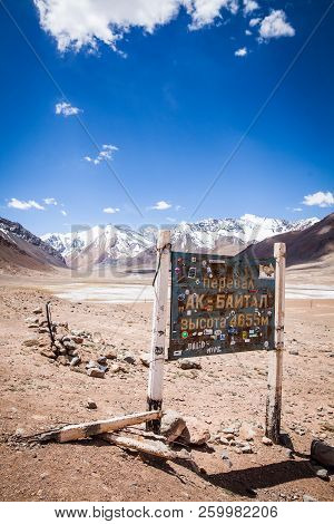 Ak Bayral Pass, Tajikistan - June 23, 2017: View Of The Indicator At The Ak Baytal Pass (4655m), On 