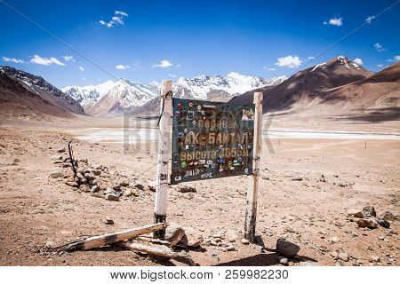 Ak Bayral Pass, Tajikistan - June 23, 2017: View Of The Indicator At The Ak Baytal Pass (4655m), On 