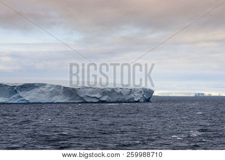 Huge Tabular Icebergs Floating In Bransfield Strait Near The Northern Tip Of The Antarctic Peninsula