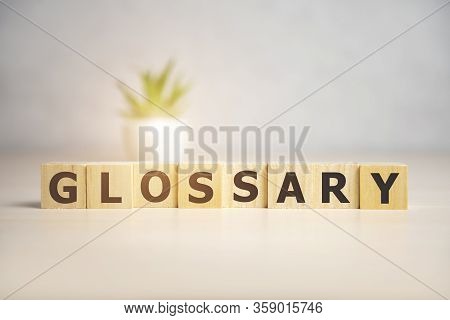 Glossary Word Made Of Square Letter Word On Sunny Background
