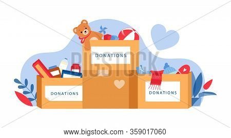 Concept Of Social Care, Clothes And Toys Donations. Boxes With Things And Toys To Donation For Needi