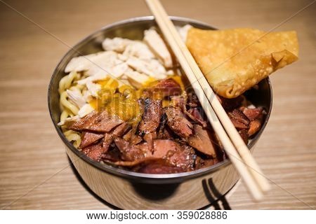 Closeup Image Of Indonesian Food, Meat Noodles, Bakmi, Served On A Bowl With Chopstick.