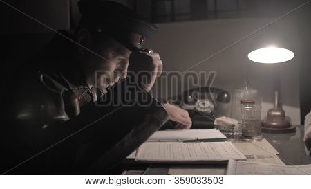 Nkvd Officer Interrogates A Prisoner, Ussr Time