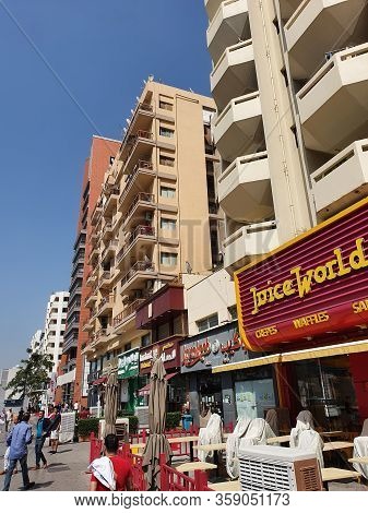 Dubai, Uae - February 21, 2020: People On The Street Of Deira Area In Dubai. Deira Is An Old Commerc