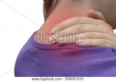 The Woman Has A Sore Neck. A Young Woman Clings To Her Neck, Sharp Pain.