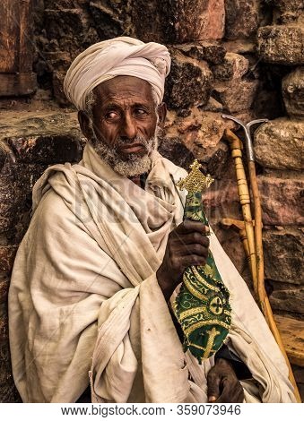 Lalibela, Ethiopia - Feb 14, 2020: Ethiopian Priest At The Famous Monastery Neakuto Leab Near Lalibe