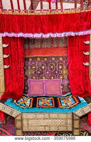 Kazakh Traditional Yurt Nomadic House Interiour Made Of Natural Materials With Bright Elements