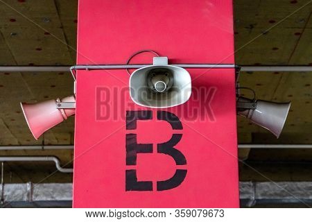 System Of Alert For Population. Mounted On Concrete Poles Under The Ceiling Of A Building To Inform 