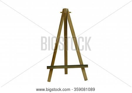 Small desktop wooden easel for artists isolated on a white background. Working equipment of the arti