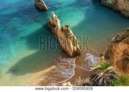 A Beautiful Bay Landscape On The Portuguese Beach Of Boiao, A Clear Blue Turquoise Sea. Algarve
